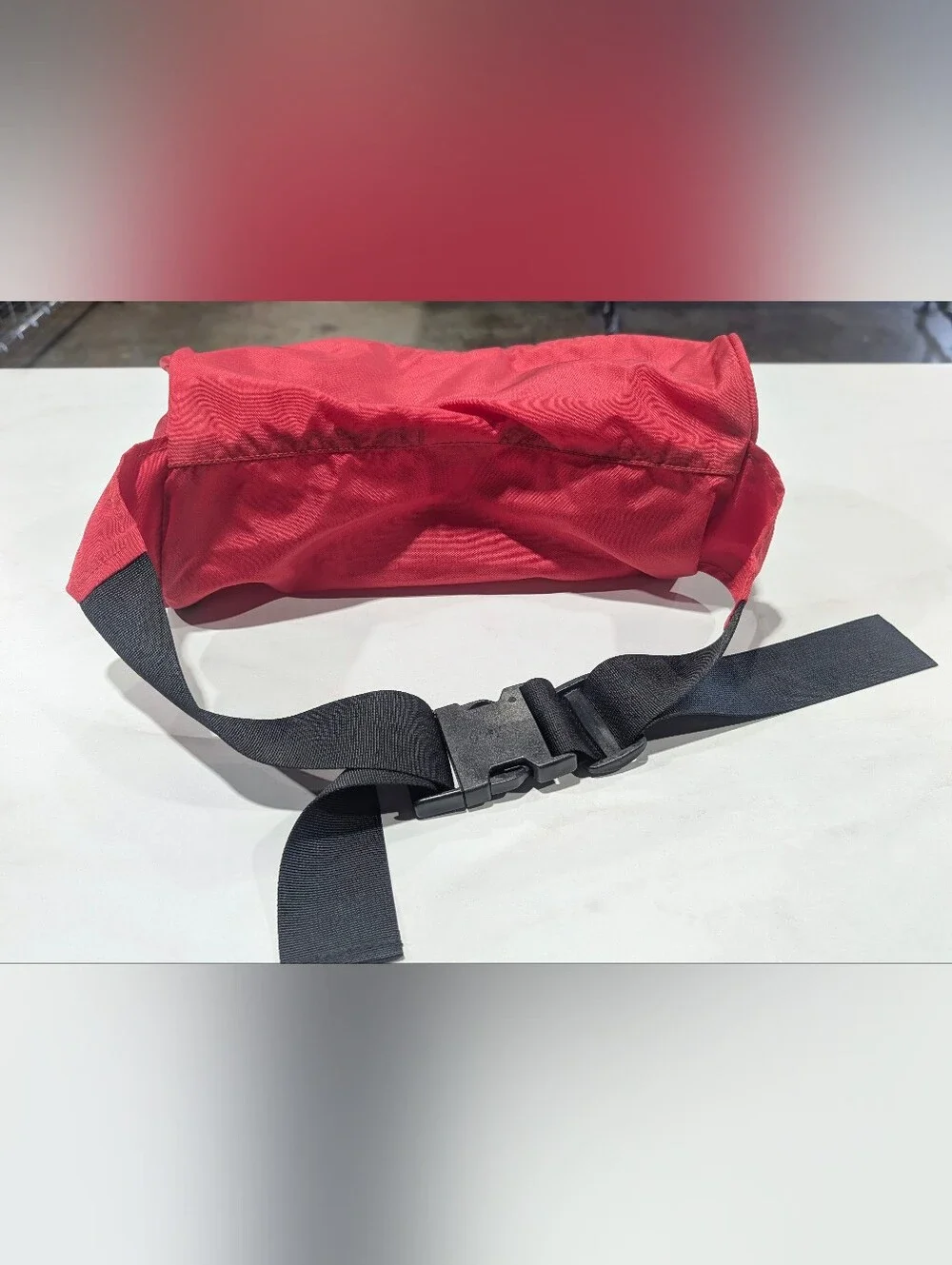 The North Face Red Lumbar Pack with Blue Trim